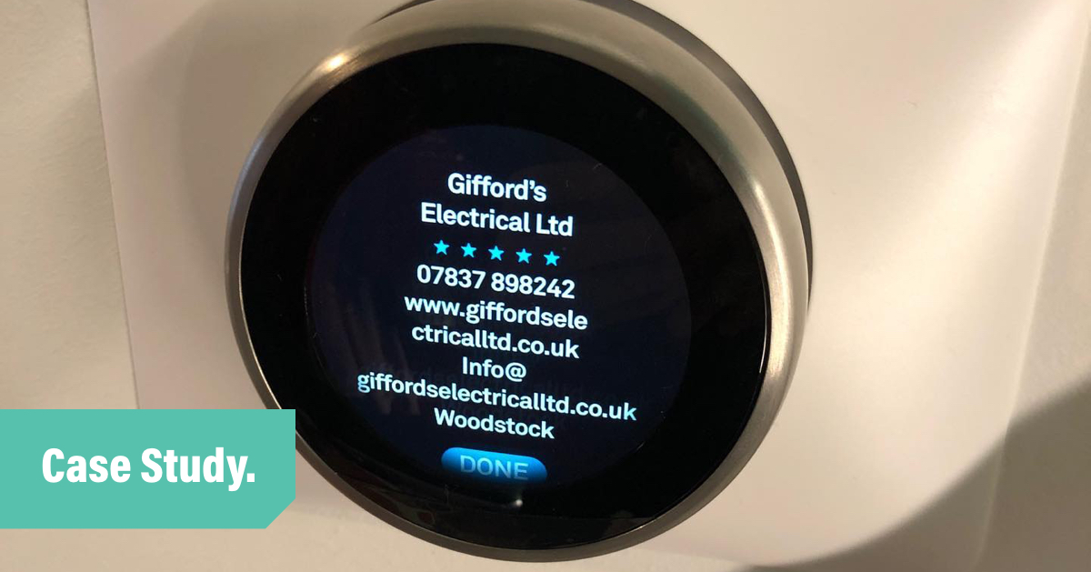 A Google Nest thermostat with Gifford Electrical's contact details displayed on it's screen