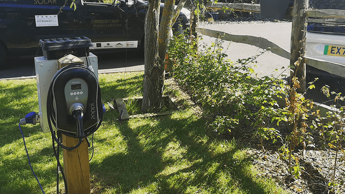 lawn with electric car charging portal 