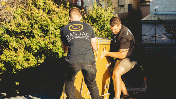 Flat Rate vs Hourly_danjac electrical carrying big cardboard box