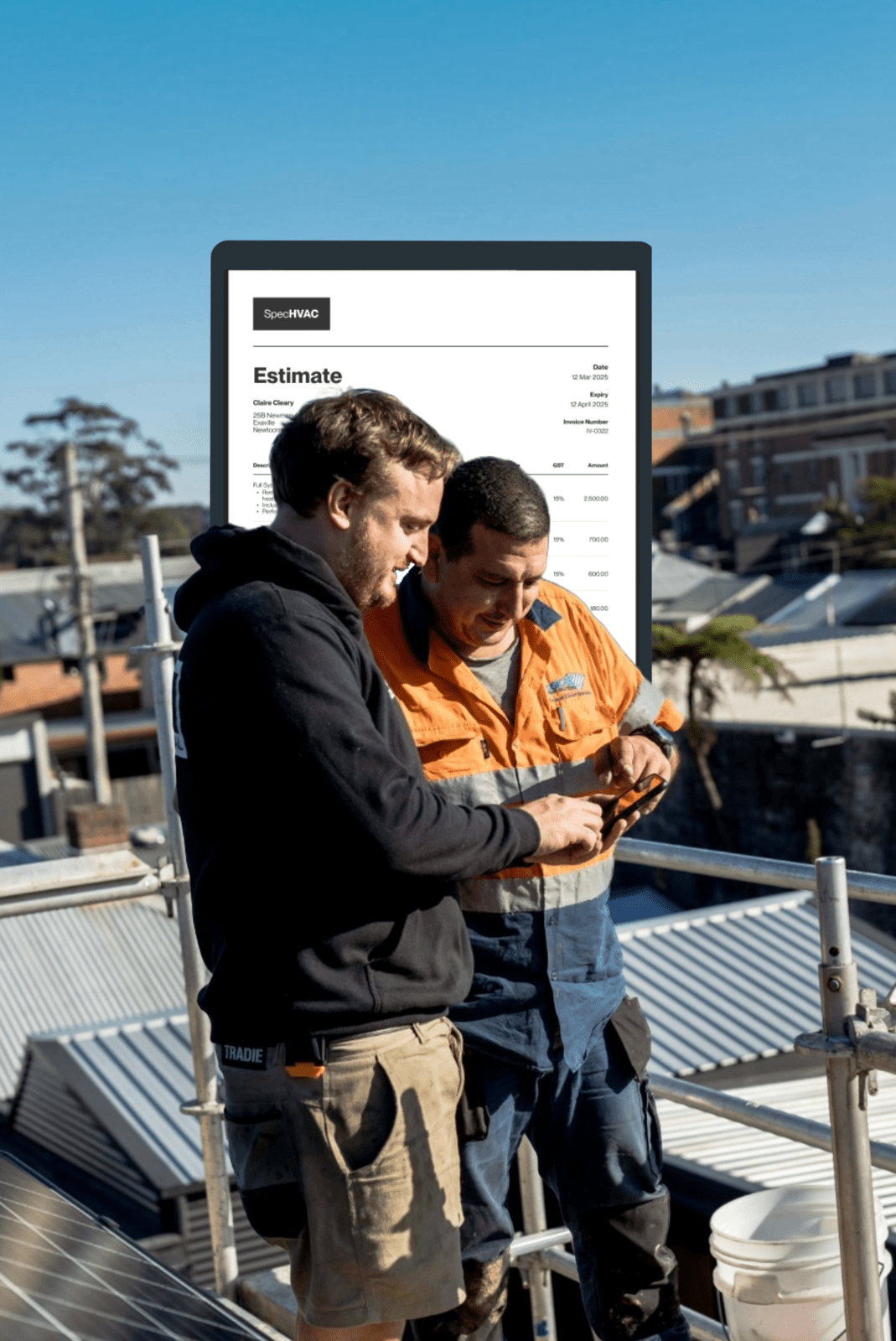 two tradespeople on a roof