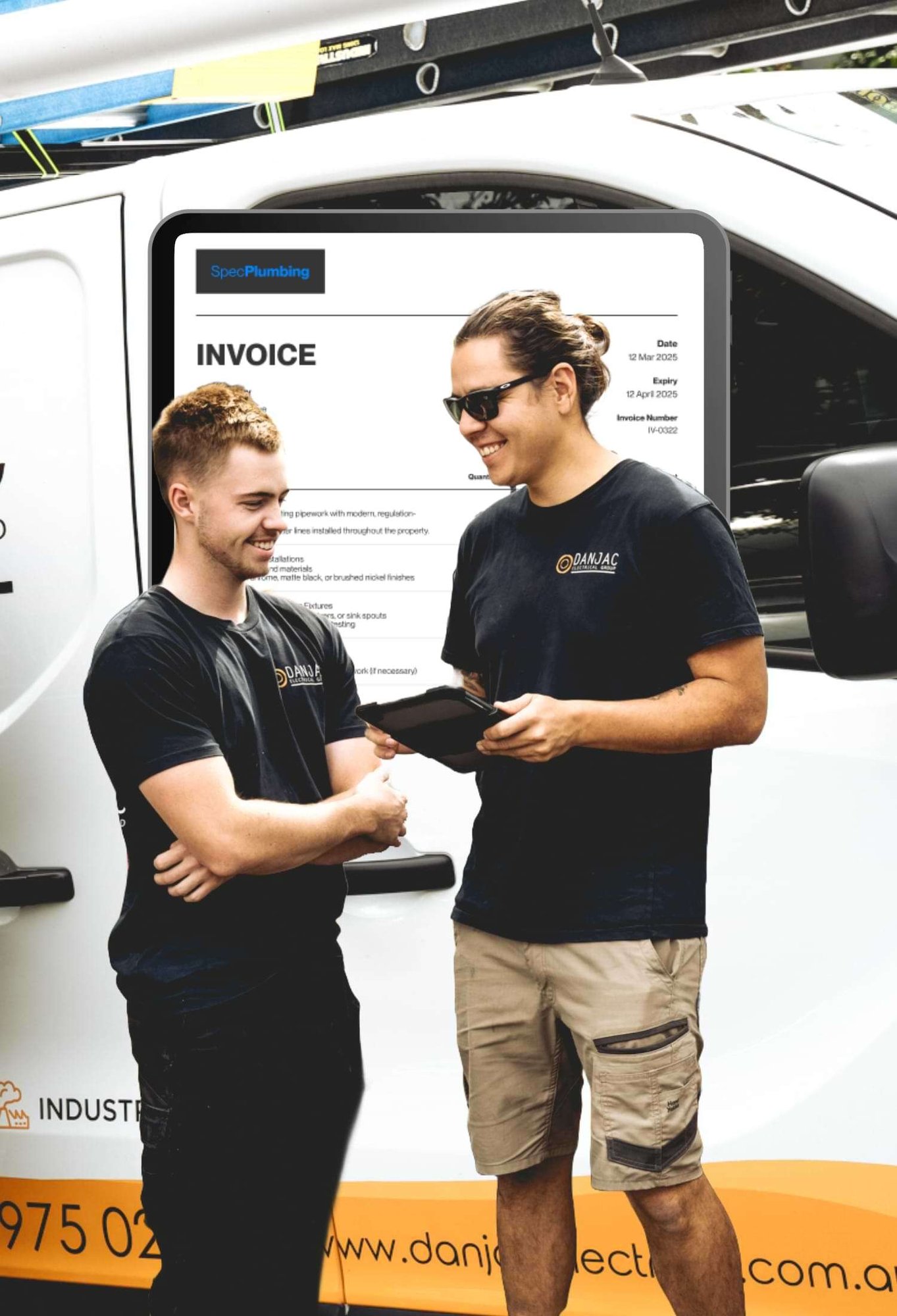 two tradespeople looking at ipad